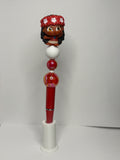 Disney character Moana topper for beaded pen. Black ink. Comes with ink refill. Made with acrylic and silicone beads. (Note: I do not own character)